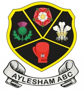Emblem of Aylesham Community Trust featuring local symbols and the ABC motto, representing community spirit and local heritage.