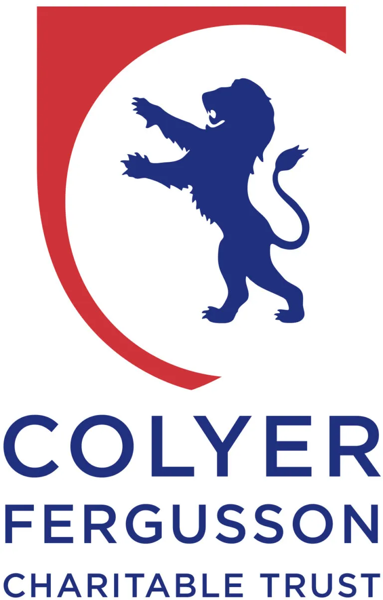 Loyalty Lion logo featuring a blue lion within a red and white circular design, representing community trust and charitable support.