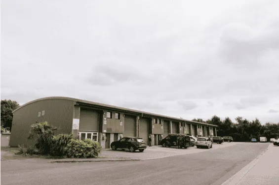 Modern community center building with parking in Aylesham, Kent, serving as a hub for local events and activities, supported by Aylesham Community Trust.